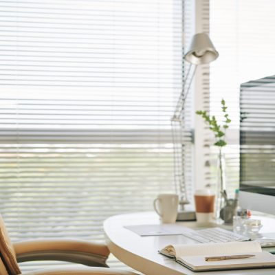 Workplace of business person with planner and computer on it